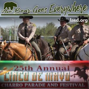 Sheriff Villanueva on horsback with mounted deputies in parade