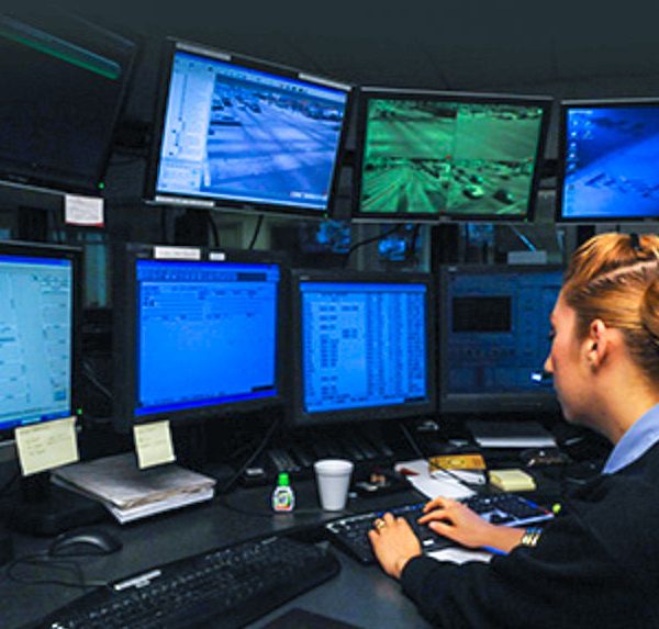 911 operator at desk routing calls