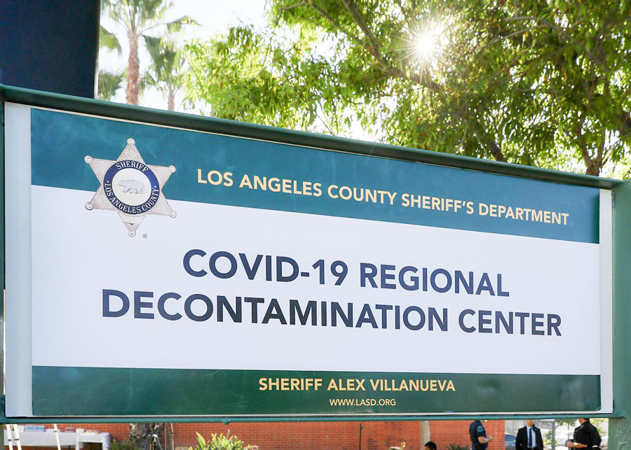 Large sign that reads, : Covid-19 Regional Decontamination Center.