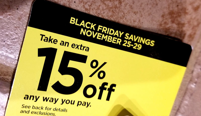 Sale tag. back and yellow tag: Black Friday Savings November 25-29. Take an extra 15% off any way you pay.
